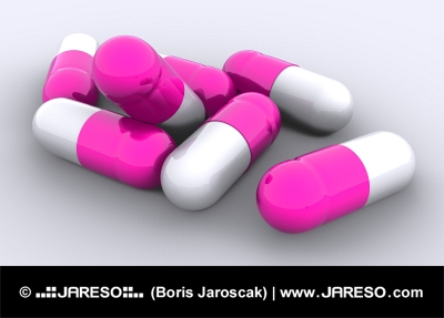 Několik abstraktních růžových tabletek